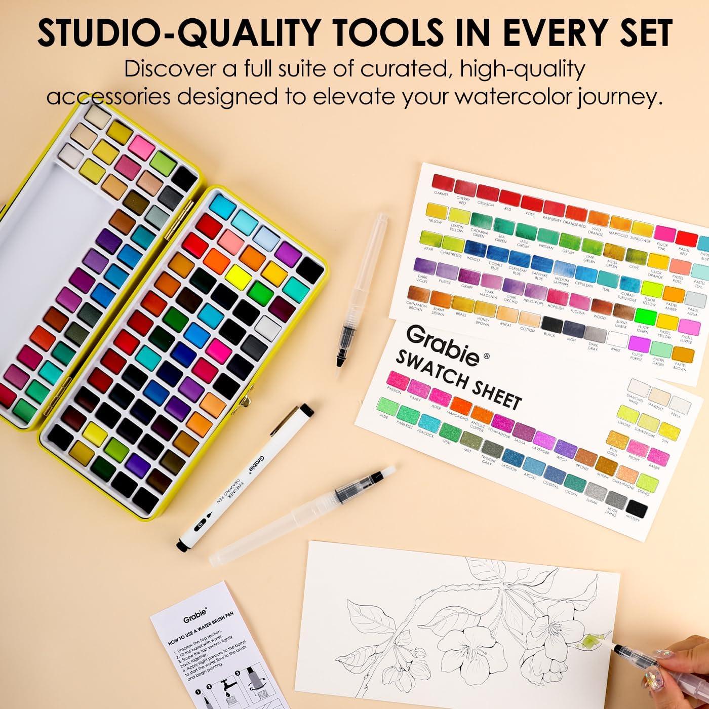 image:imageGrabie 100 Colors Premium AllInOne Watercolor Paint Set 50 Essential 35 Metallic 10 Pastels 5 Neon Hues Portable Case Brush Pens Paper Pad Waterproof Fineliner Pen Beginner amp Professional100 ColorsPremium